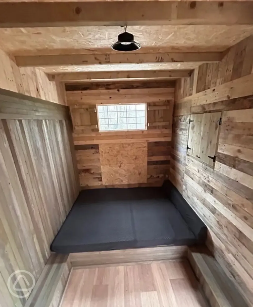 The Badgers Burrow glamping cabin interior