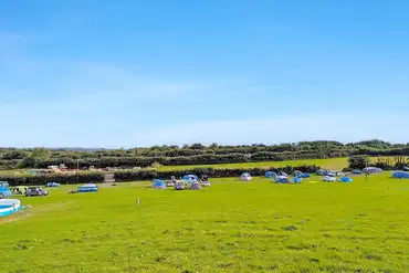 Non electric and electric grass pitches on the camping field