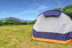 Non electric grass pitches (5m x 8m) at Wenallt Wild Camp