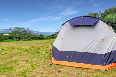 Non electric grass pitches (5m x 8m) at Wenallt Wild Camp