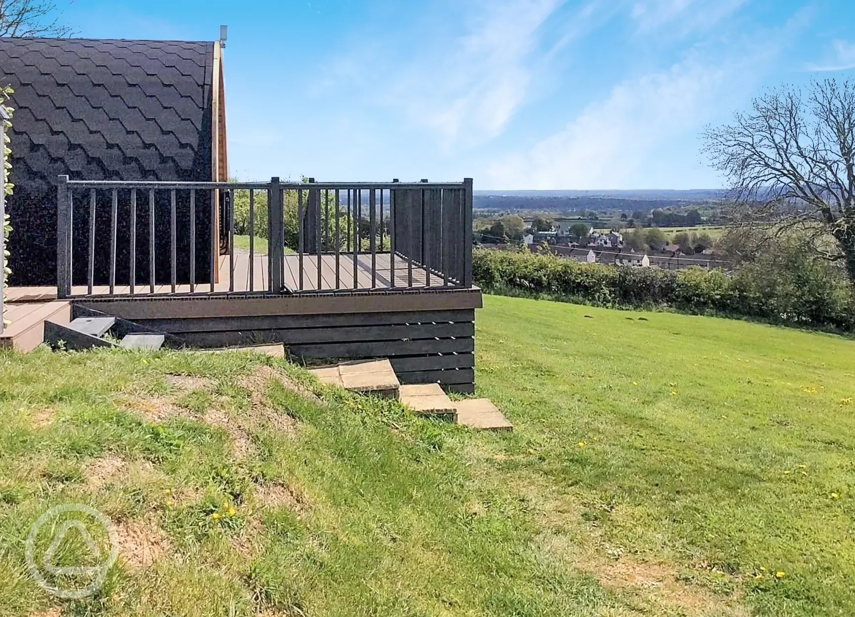 Ensuite pod with hot tub outdoor decking and view