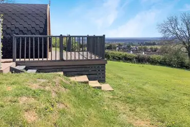 Ensuite pod with hot tub outdoor decking and view