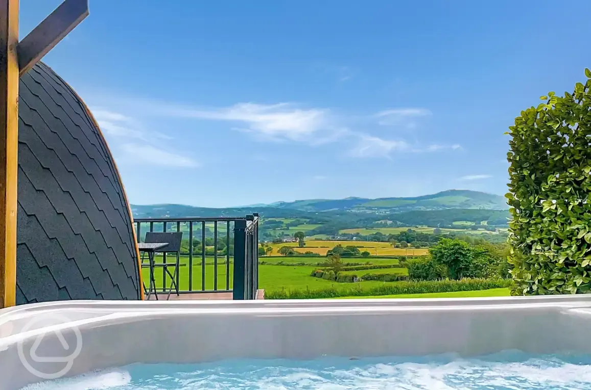 Ensuite pod with hot tub outdoor decking and view