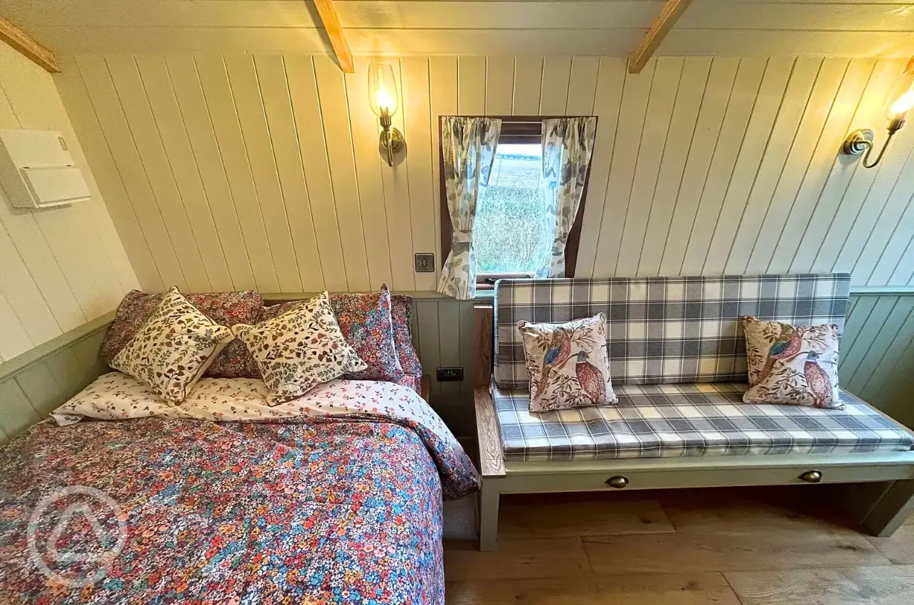 Shepherd's hut double bed and double sofa bed