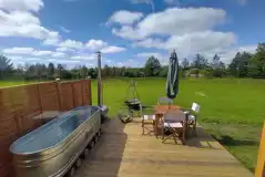 7m luxury European yurt decking with wood-fired tub and seating 7m luxury European yurt decking with wood-fired tub and seating
