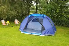 Non electric grass tent pitches measuring 6m by 6m for tents and trailer tents