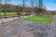 Riverside electric hardstanding pitches with electric and water hook ups