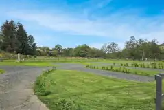 Electric hardstanding pitches with grass area