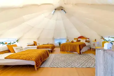 Bell tent interior at Beachside Glamping Dale (bedding provided)