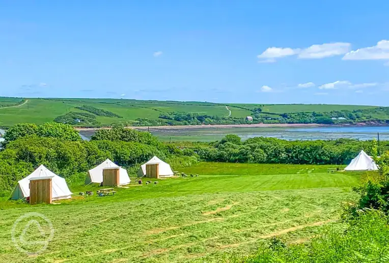 Bell tents by the coast