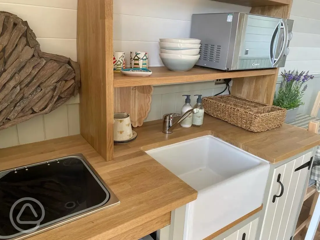 Ensuite glamping pod with hot tub kitchen