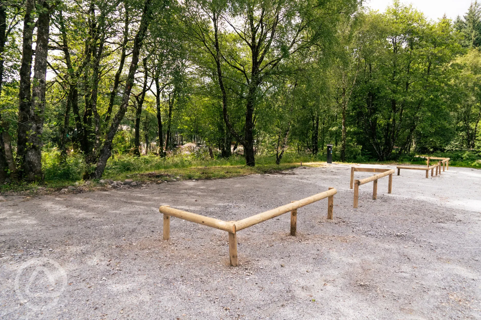 Electric hardstanding pitches with wooden marked boundaries