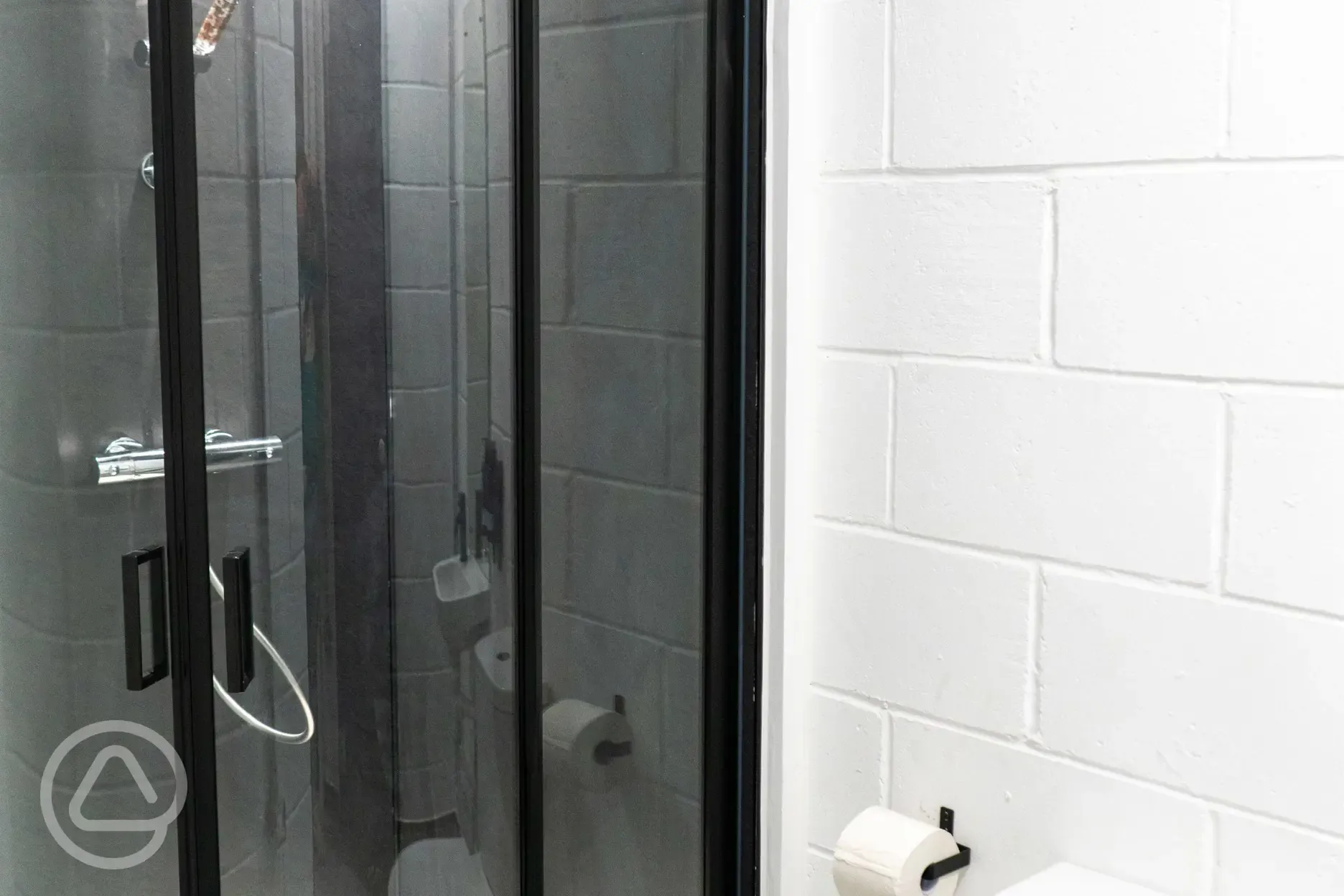 Modern bathrooms with toilets and showers