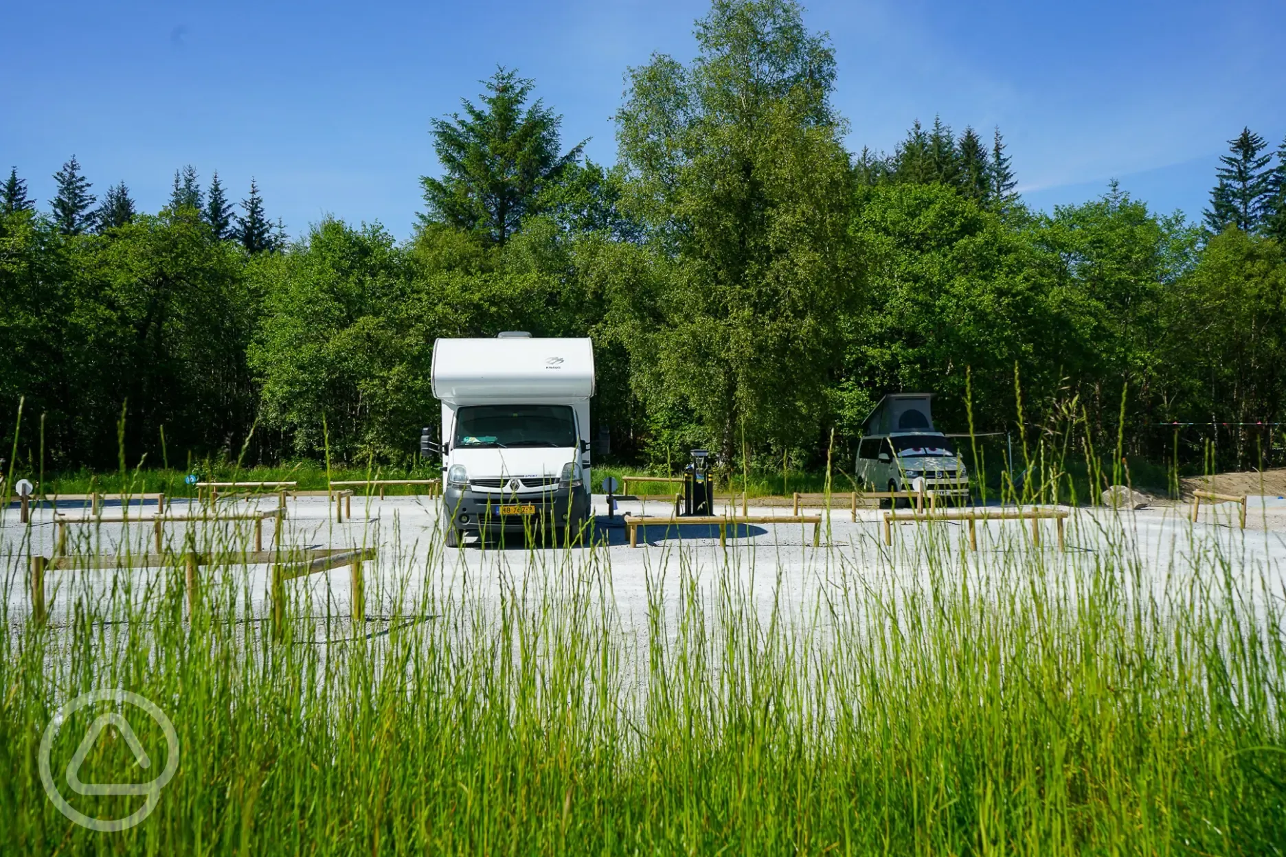 Electric hardstanding pitches with wooden marked pitch boundaries