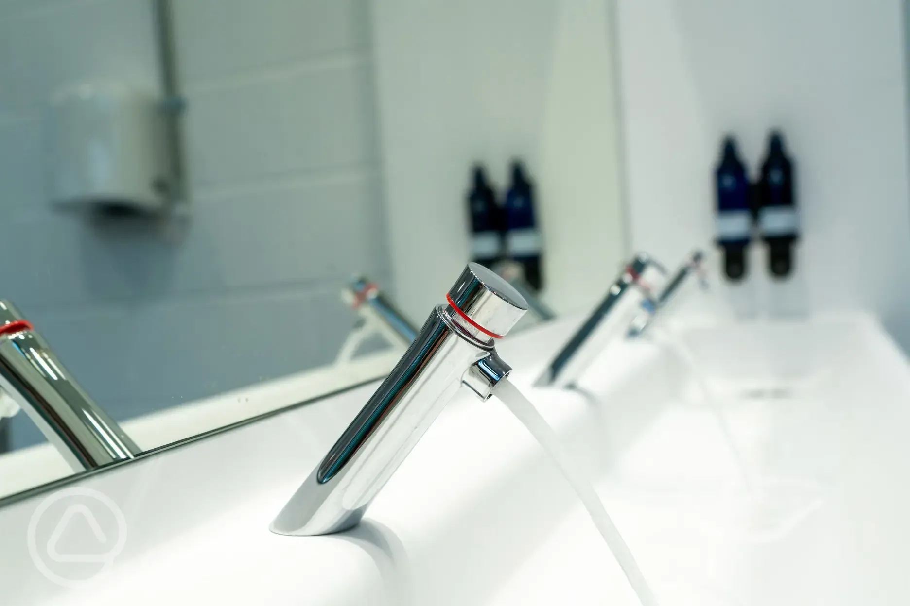 Facilities sink with hand wash and hand cream