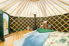 Yurt interior with kettle and storage space Yurt interior with kettle and storage space