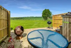 Yurt private patio area and raised BBQ Yurt private patio area and raised BBQ