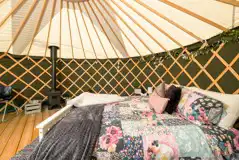 Yurt king size bed (bedding provided) Yurt king size bed (bedding provided)
