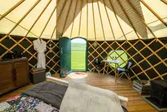 Yurt interior with dining table and chairs Yurt interior with dining table and chairs