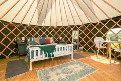 Yurt interior with dining table and chairs Yurt interior with dining table and chairs