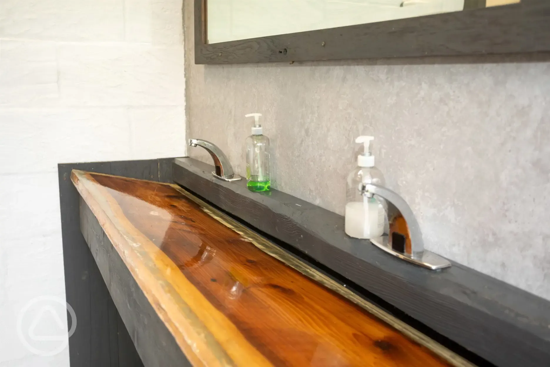 Handwashing sink with a mirror