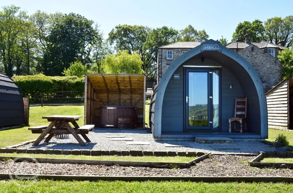Glamping pod with hot tub exterior 