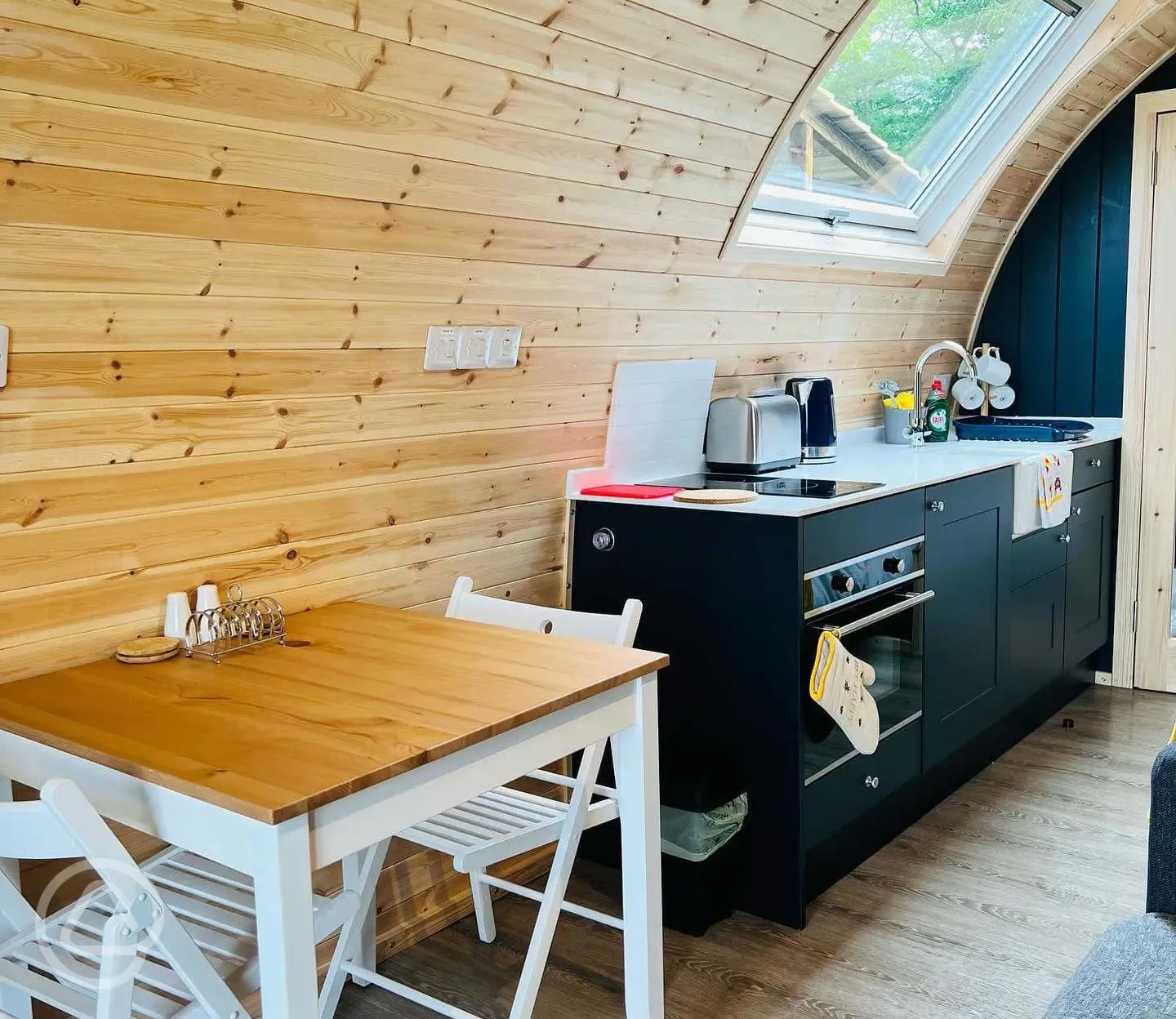 Glamping pod kitchenette and dining area