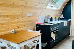 Glamping pod kitchenette and dining area