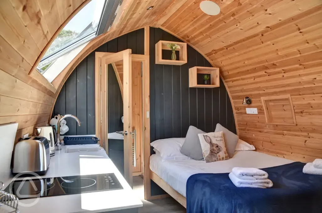 Glamping pod with hot tub bed
