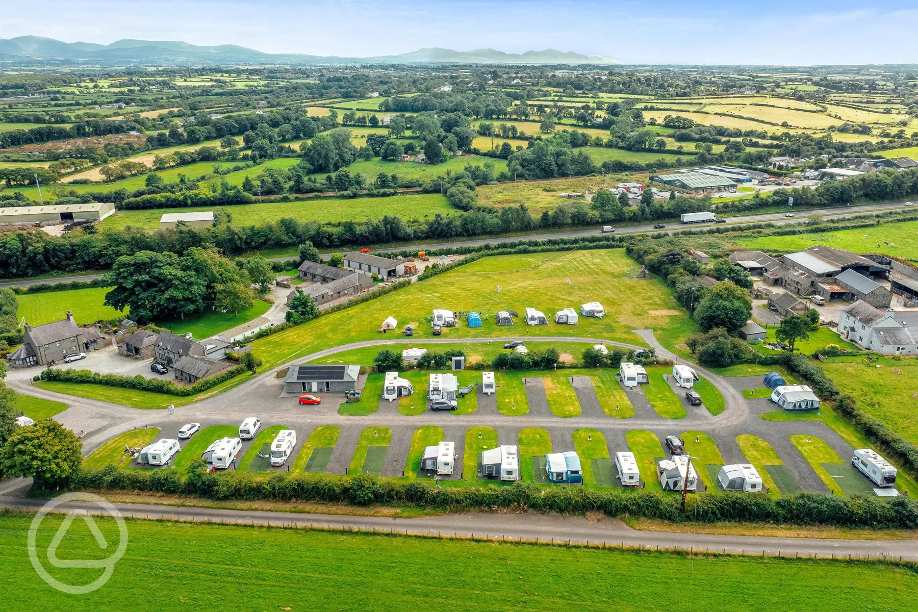 Aerial of the campsite and views over Snowdonia