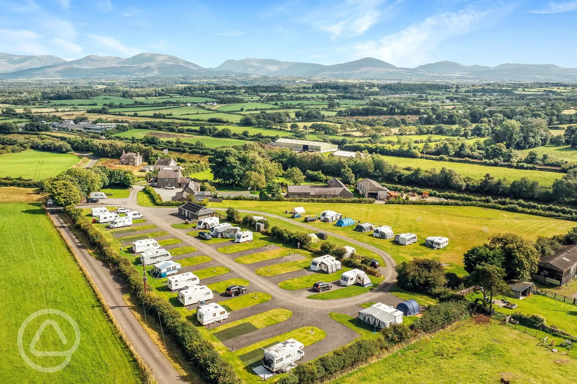 Aerial of the campsite and views over Snowdonia