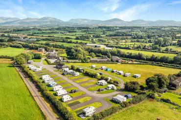 Aerial of the campsite and views over Snowdonia