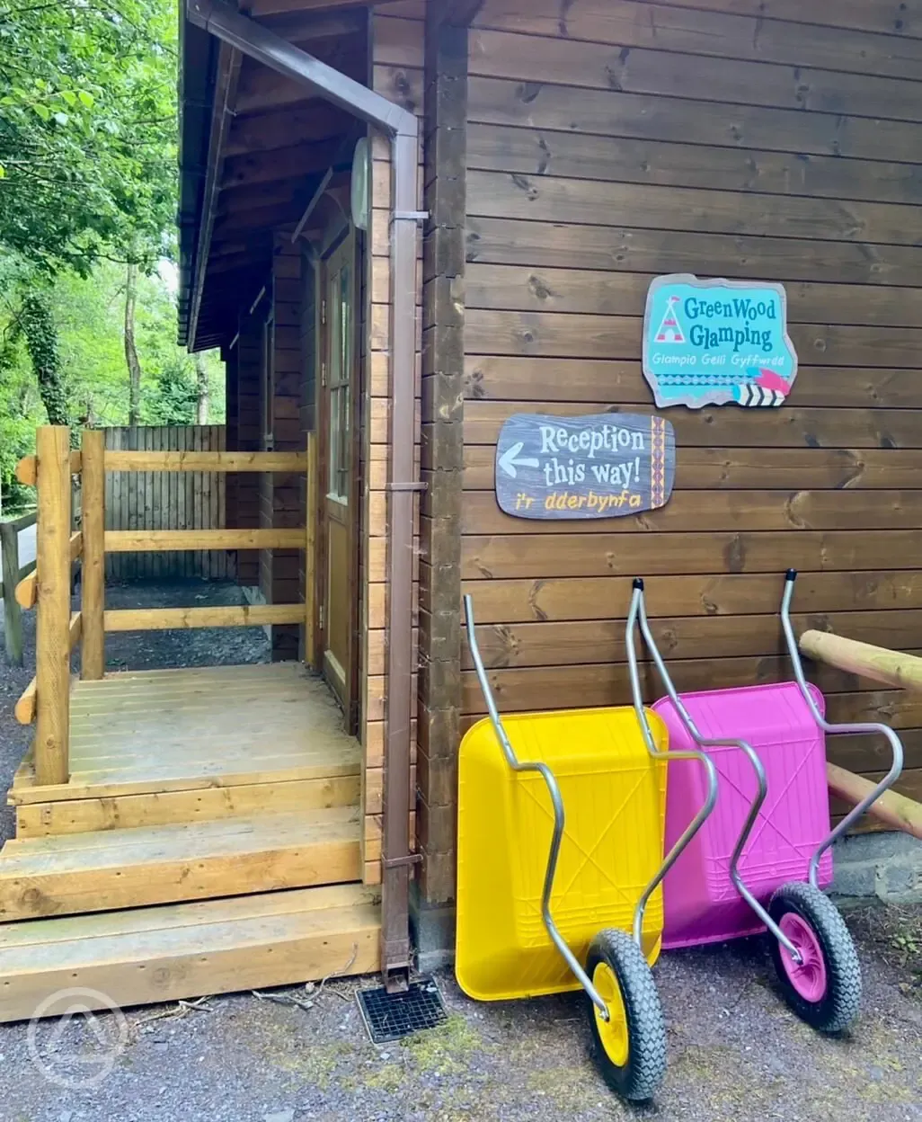 Reception with wheelbarrows for luggage