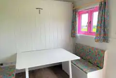 Shepherd's hut dining area Shepherd's hut dining area