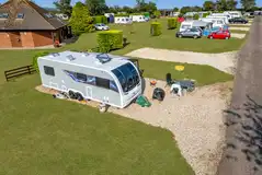 Prime location family electric hardstanding pitches (10m x 10m)