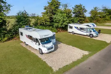 Prime location electric hardstanding pitches with 10 amp hook up