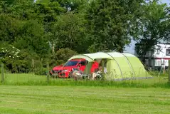 Non electric grass tent pitches with space to park alongside Non electric grass tent pitches with space to park alongside