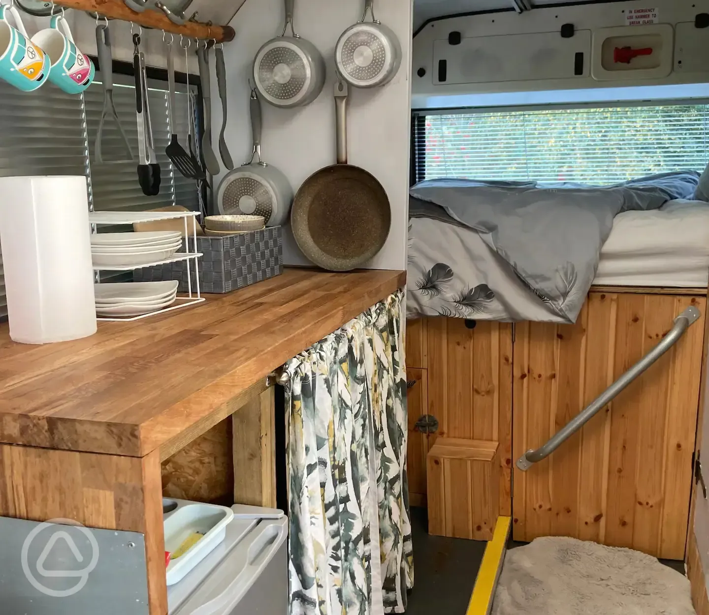 Kitchen and bed in bus