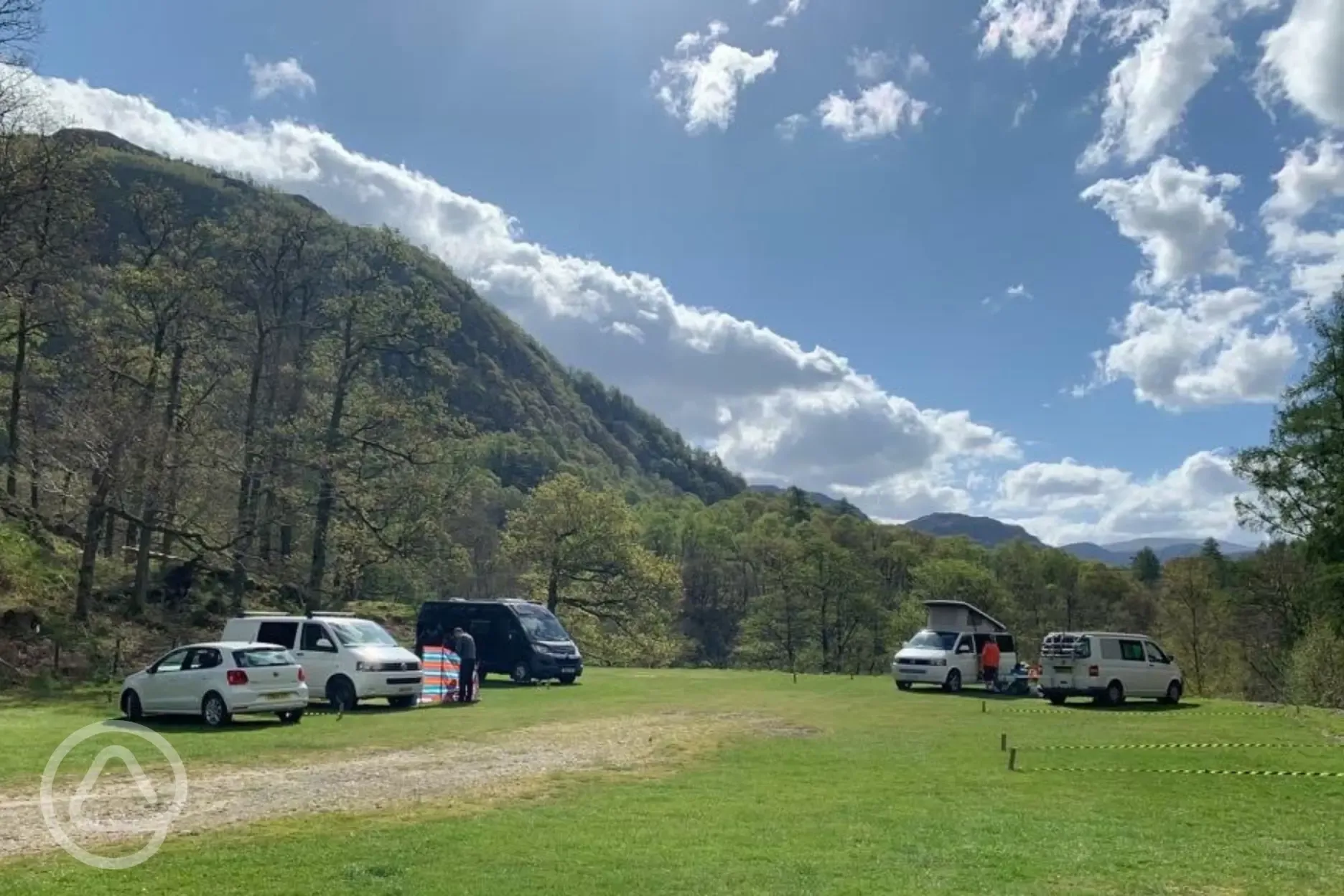 Non electric grass pitches with mountain views