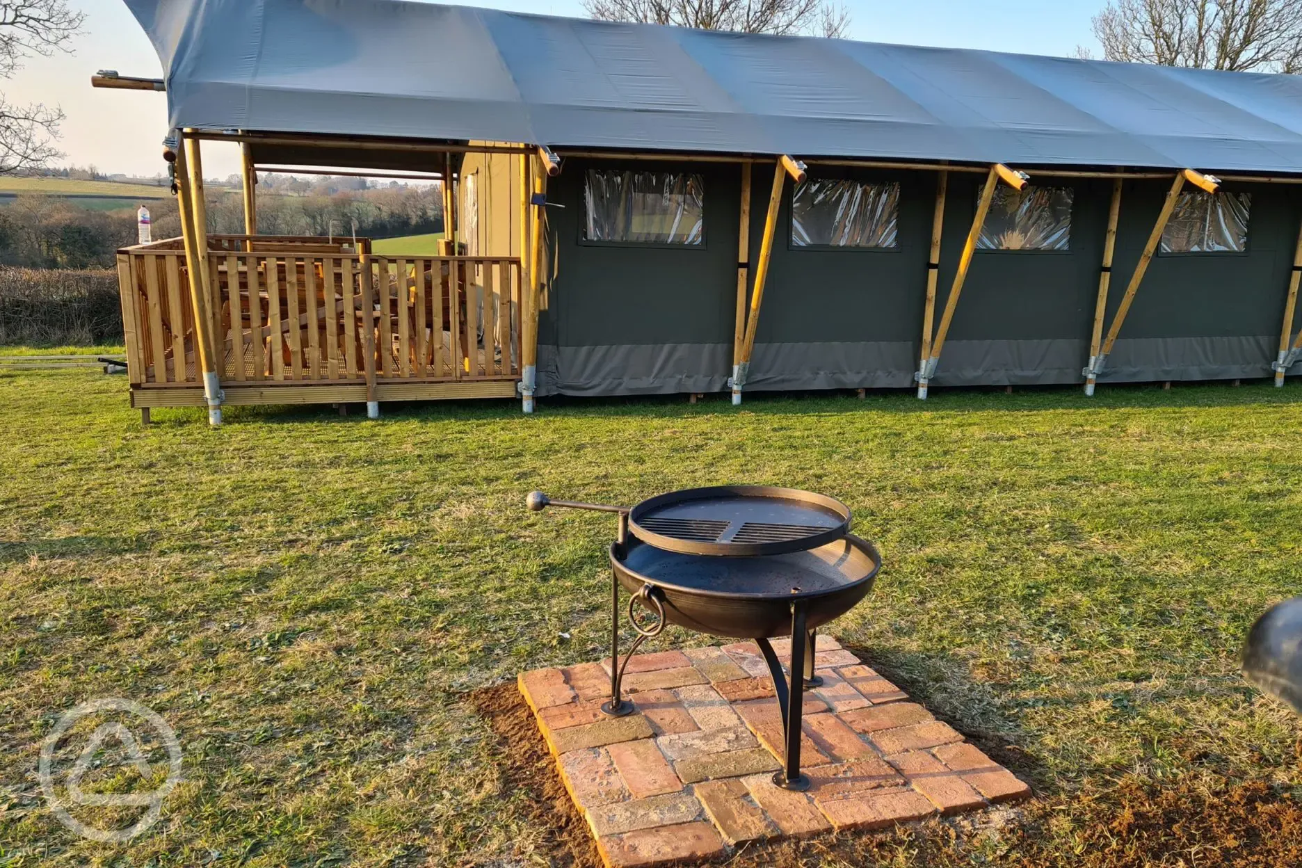Violet tent and fire pit 