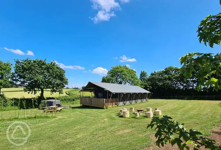Safari tent with hot tub and fire pit