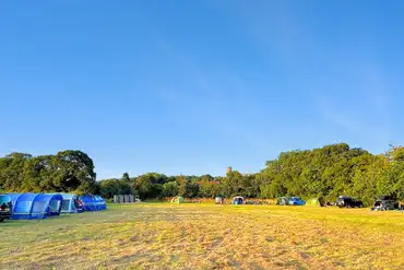 Grass pitches at Gresham Hall Glamping