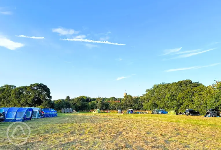 Grass pitches at Gresham Hall Glamping