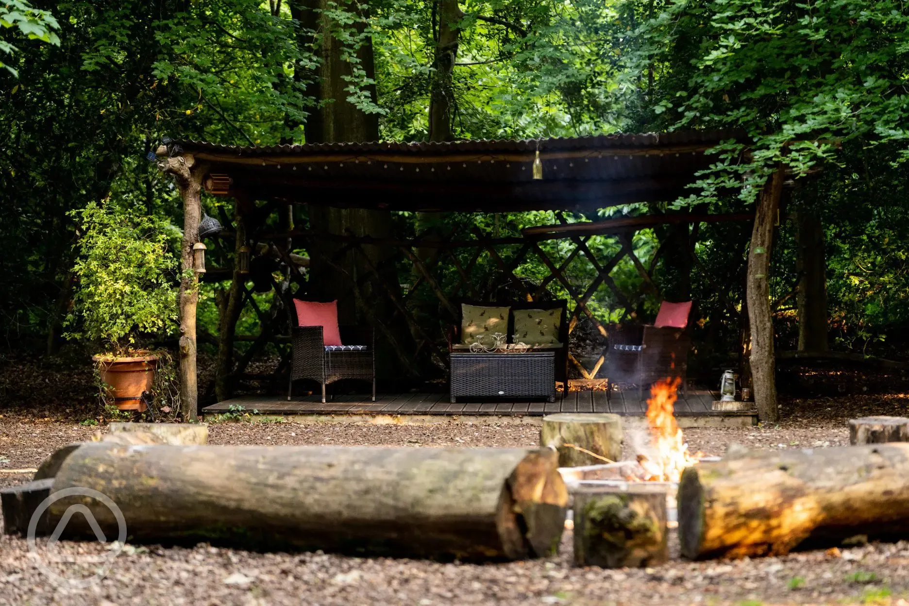 The firepit looking onto the under cover seating areas