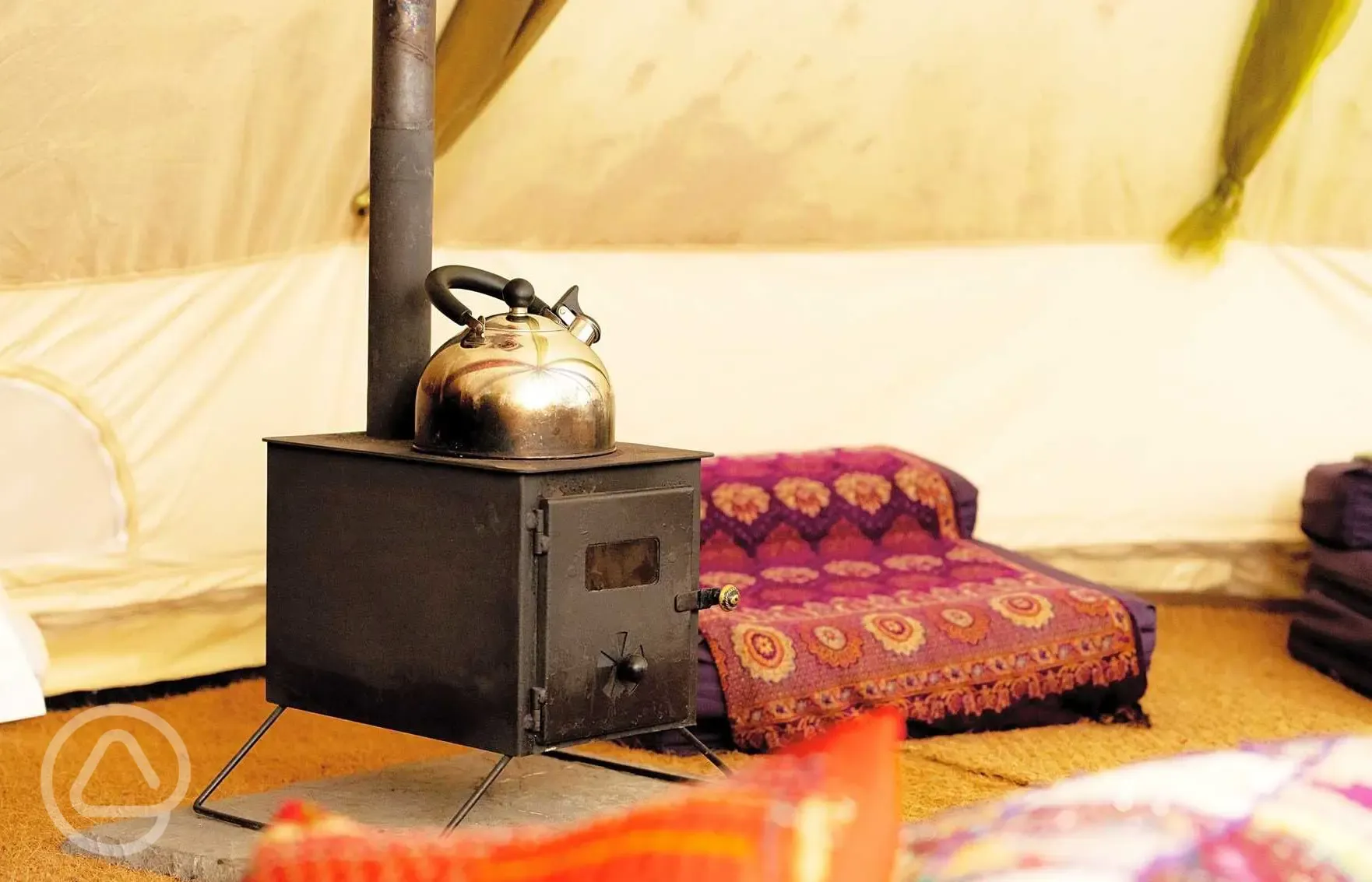 Bedouin bell tent log burning stove