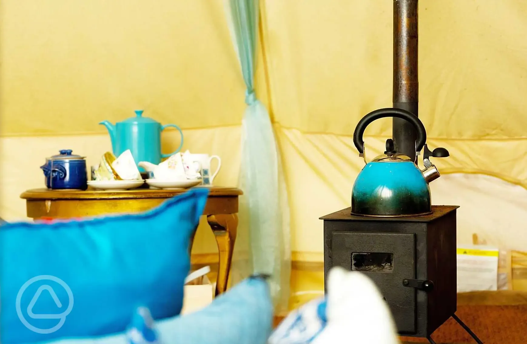 Moroccan bell tent log fire