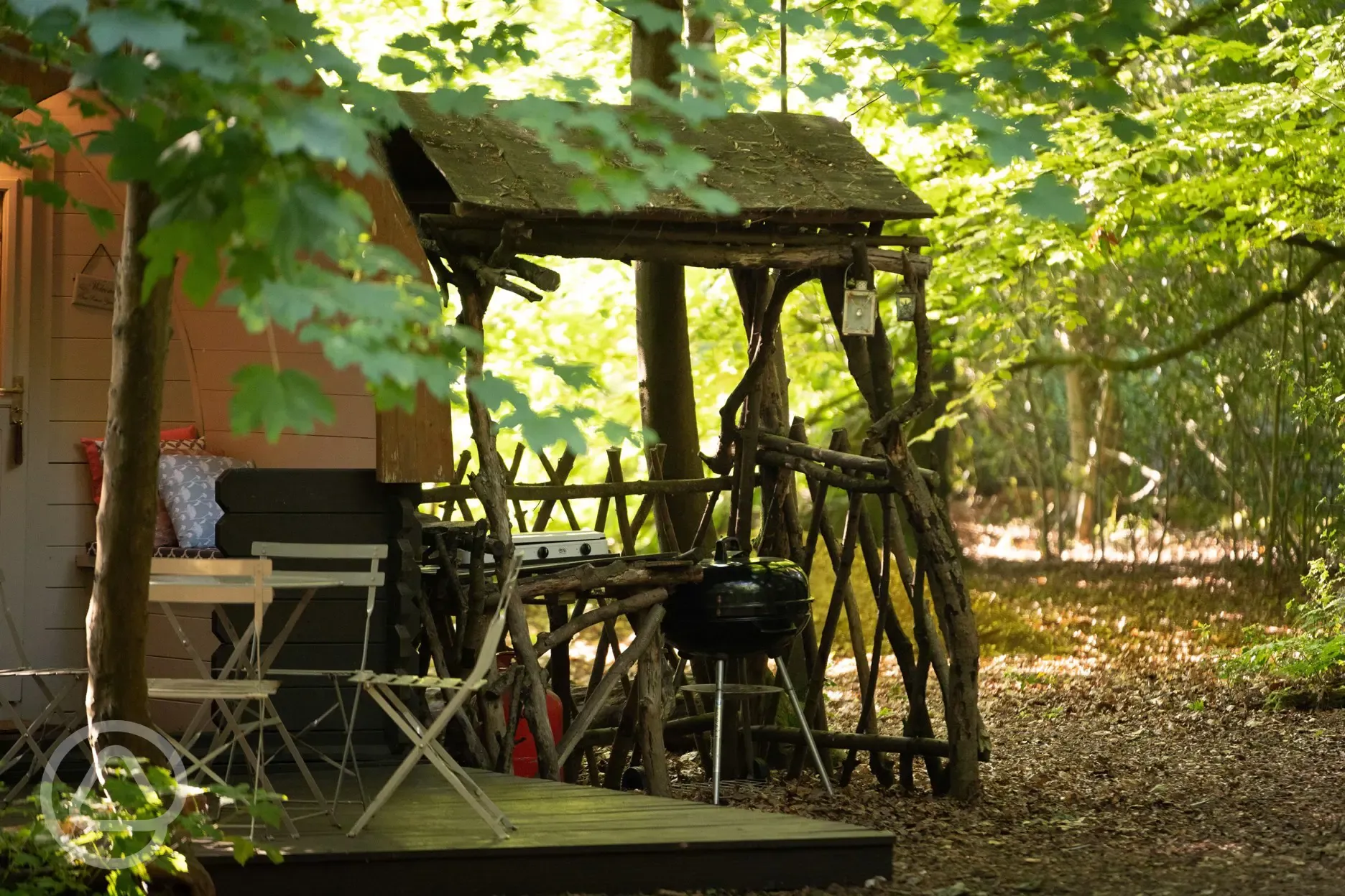 Camping pod under cover cooking area