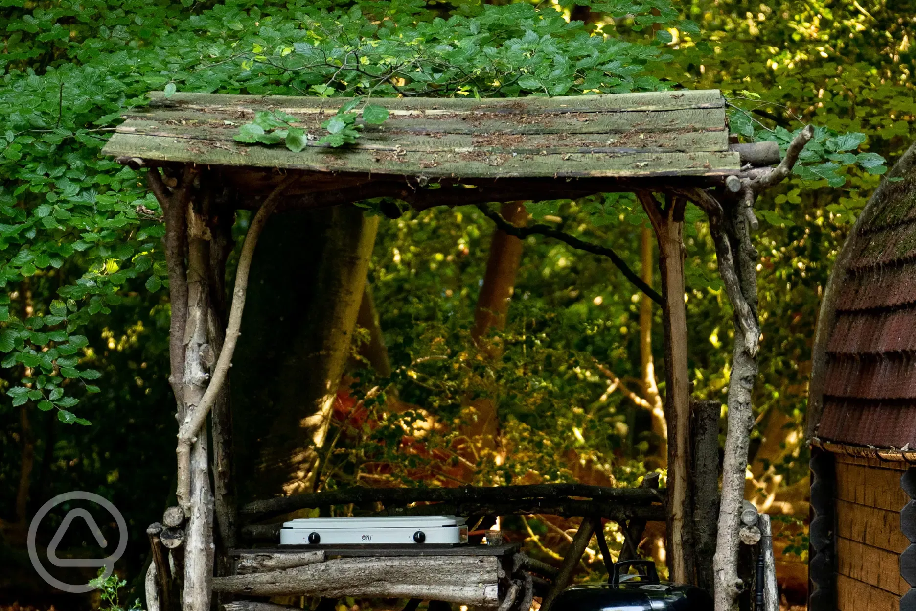 Camping pod under cover cooking area