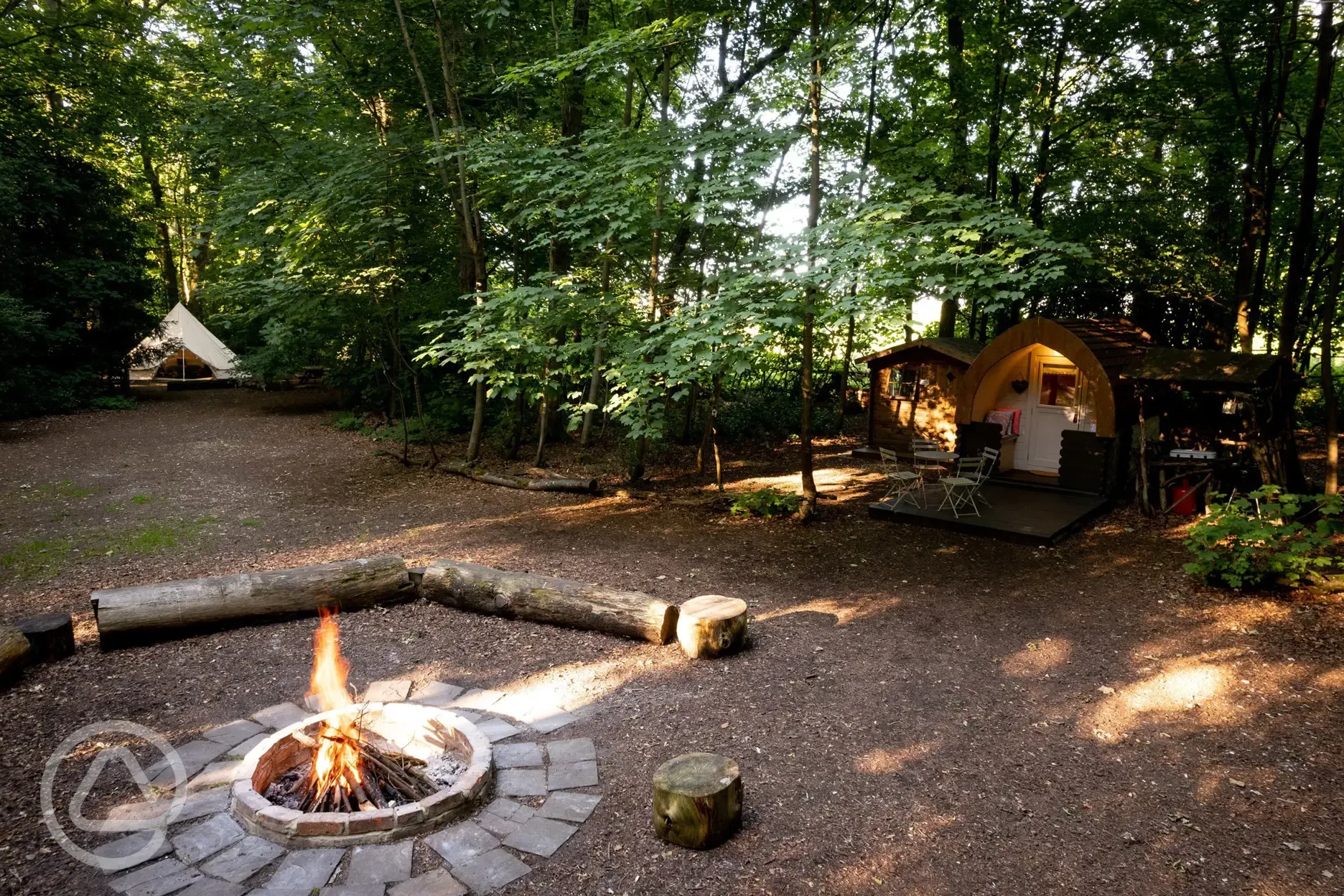 Aerial view camping pod and fire pit