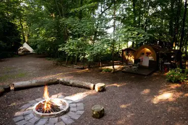 Aerial view camping pod and fire pit